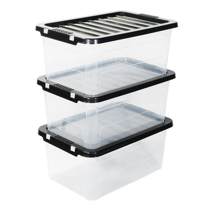 Stack of three clear 45l plastic storage containers with black lids on a white background